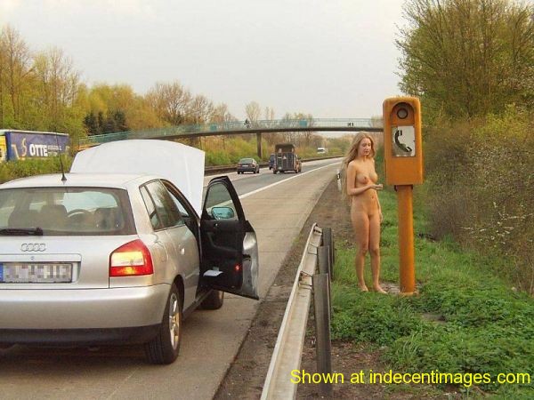 Naked girl by the side of the road