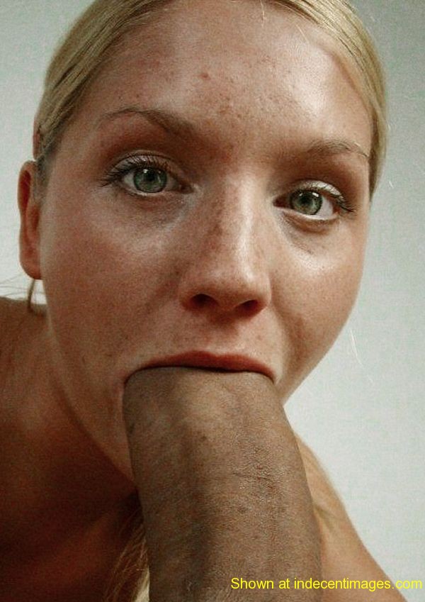 Her mouth is full of cock