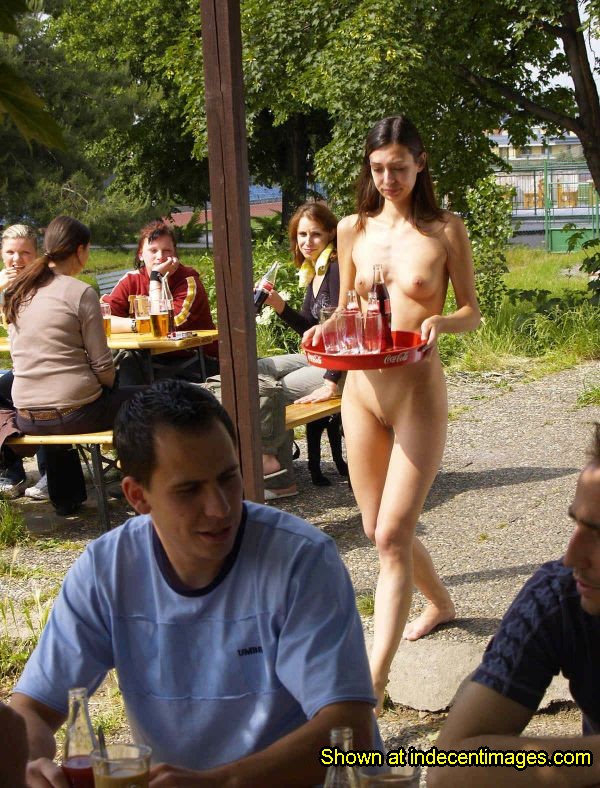Embarrassed naked waitress