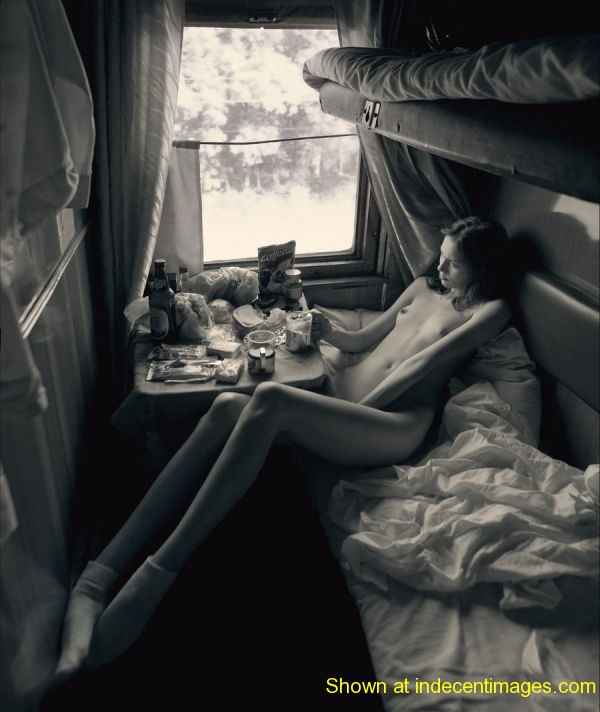 Fingers between her legs