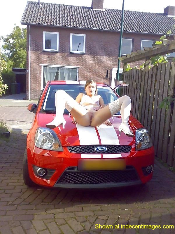 Open legged across the car bonnet!